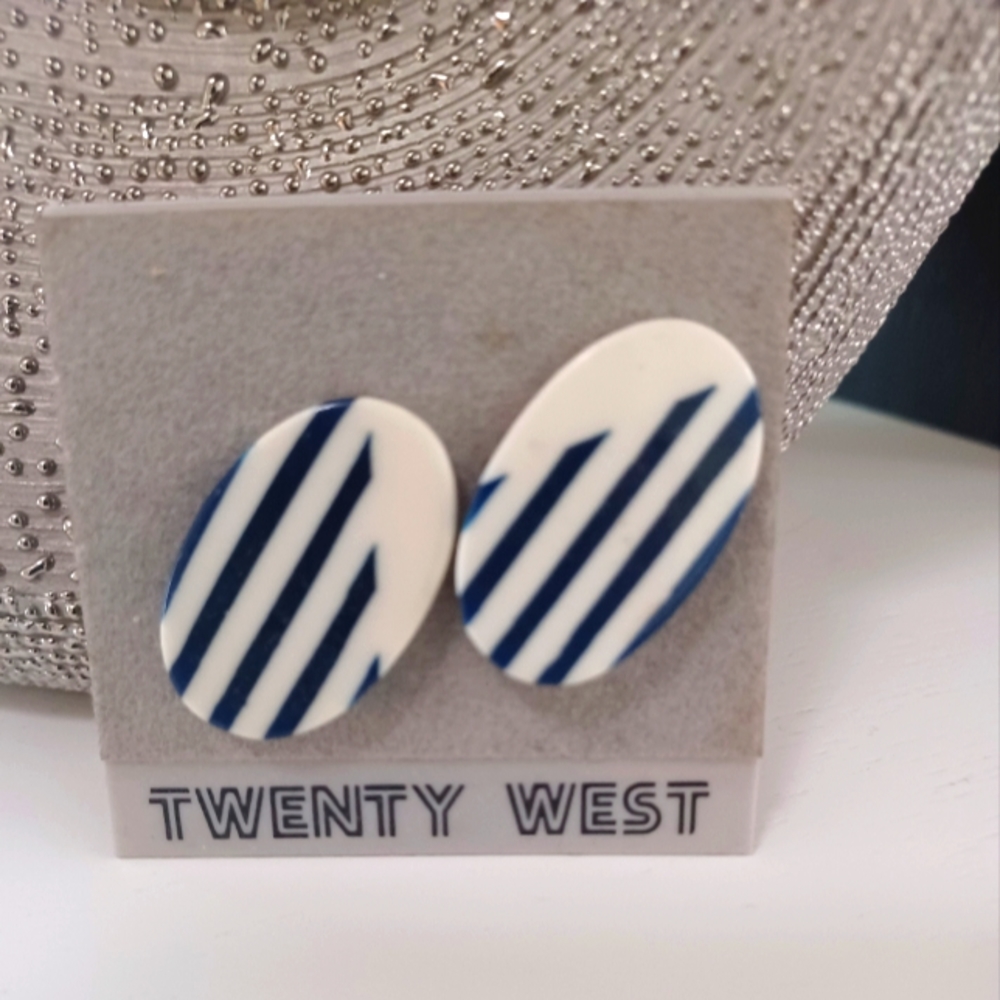 Two-tone clip on earrings, white with black stripes